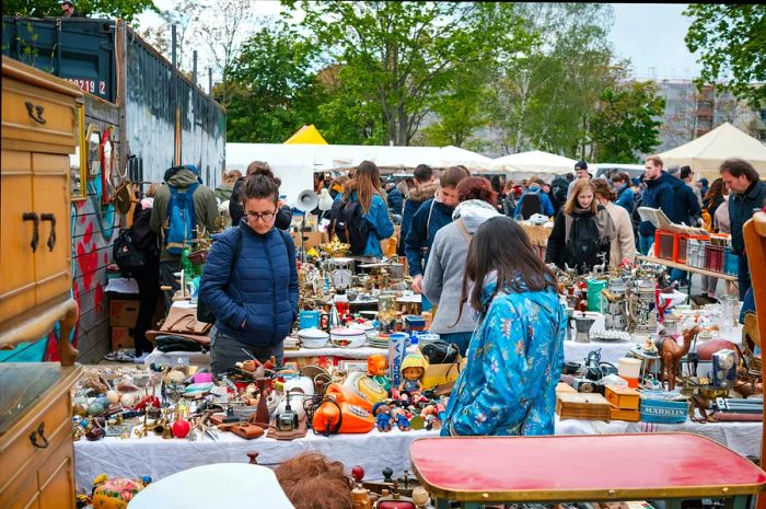 Crowds enjoy a flea market at Mauerpark on a Sunday in Berlin.