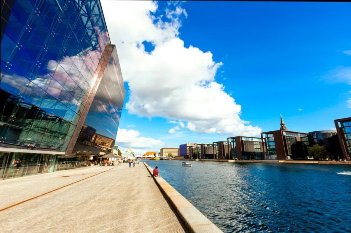 Contemporary glass structures lining the waterfront in Copenhagen, Denmark