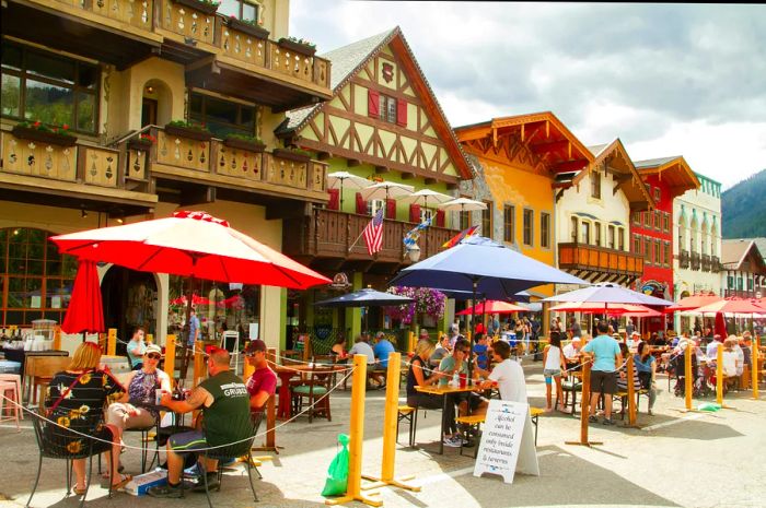 People enjoying drinks on the street in Leavenworth, WA