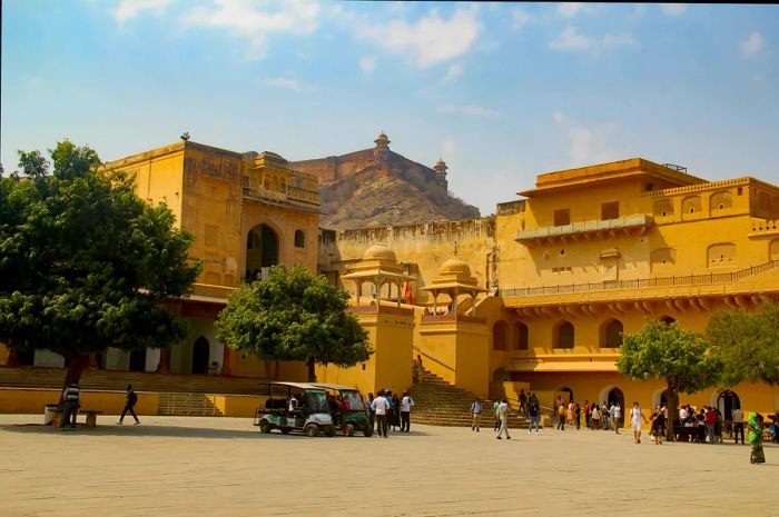 Amber Fort's Jaleb Chowk bathed in sunset hues.