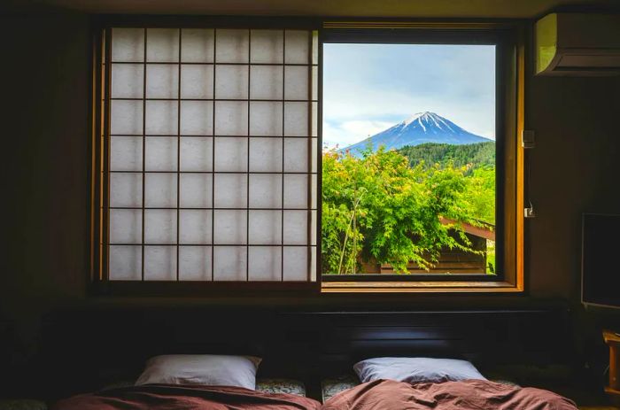 A picturesque view of Mt. Fuji from a traditional Japanese inn