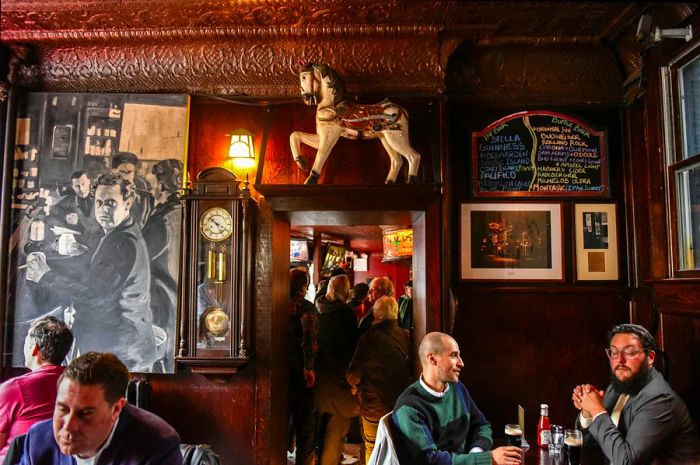 Guests at the historic White Horse Tavern in the West Village, New York City, New York, USA