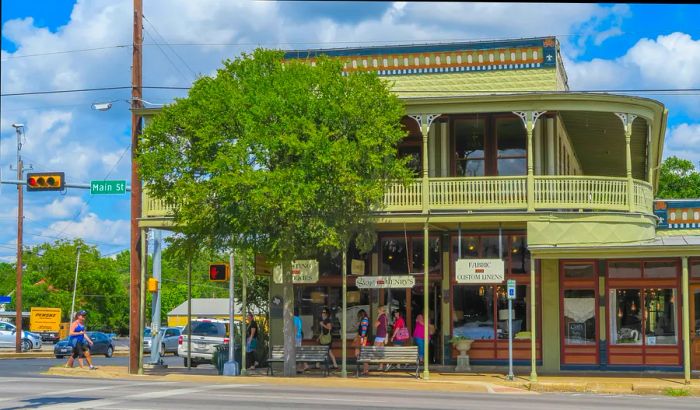 A charming corner building with balconies in a town