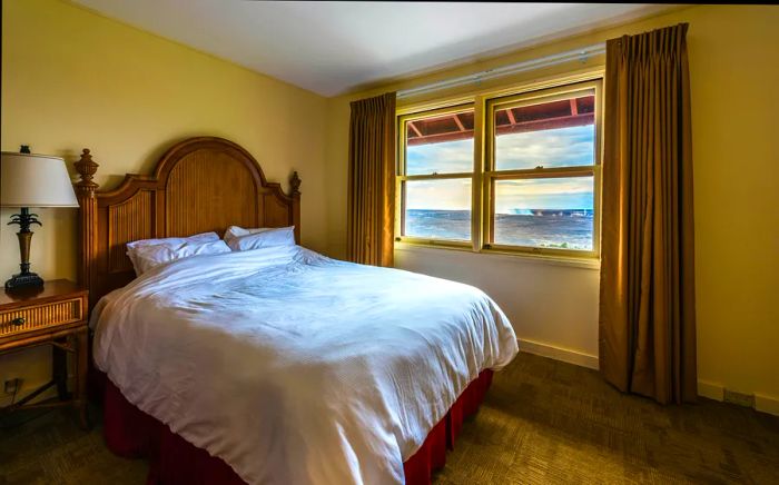 A room at Volcano House featuring a view of Halemaʻumaʻu Crater, Hawai‘i Volcanoes National Park, Hawaii, USA