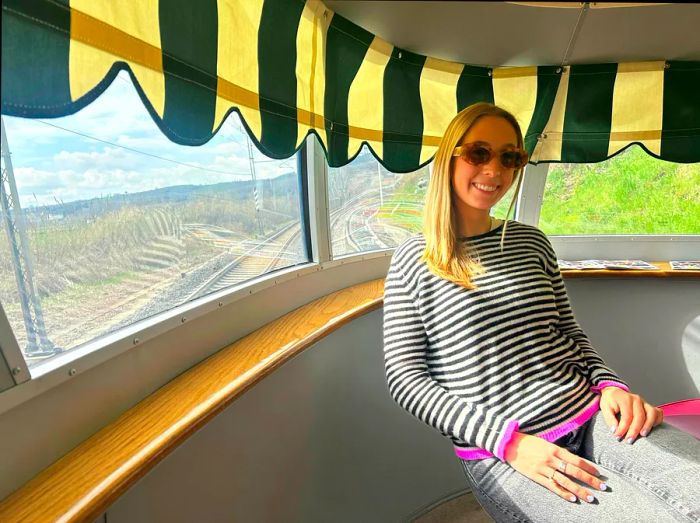 The author enjoying a moment in a viewing cabin aboard a vintage train