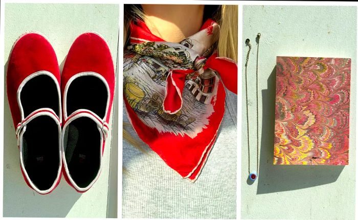 Right: A pair of red Mary Janes; Middle: A red neck scarf adorned with illustrations of Capri; Right: A marbled notebook accompanied by a glass bead necklace