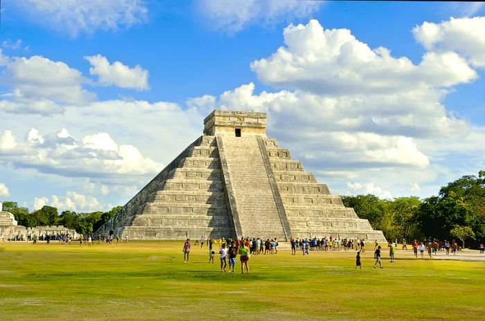 The Maya ruins of the Temple of Kukulcan at Chichén Itzá, a striking stone pyramid with a square top