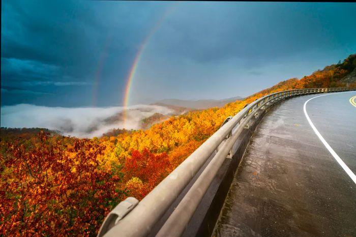 A breathtaking rainbow graces an autumn day along the Foothills Parkway in Wears Valley, Great Smoky Mountains National Park, USA