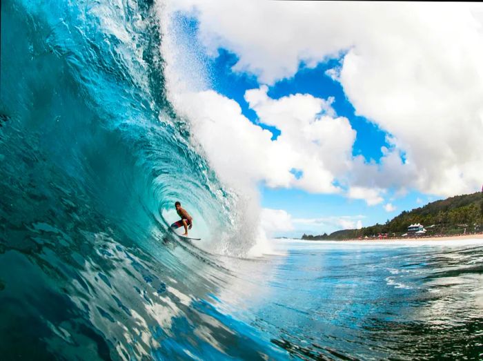 A man surfing in Hawaii