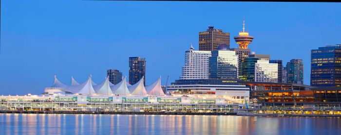 Twilight view of the Vancouver skyline from the water