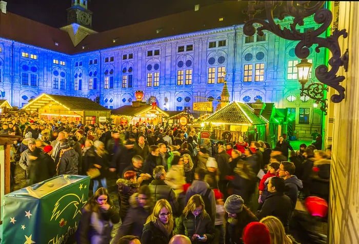 A queue of shoppers gathered outside the beautifully adorned shops.