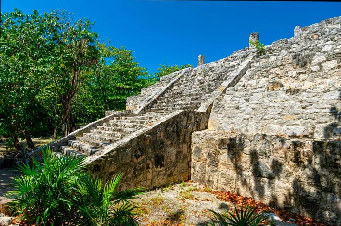 A glimpse of a staircase ascending a Maya pyramid ruin outside Cancún