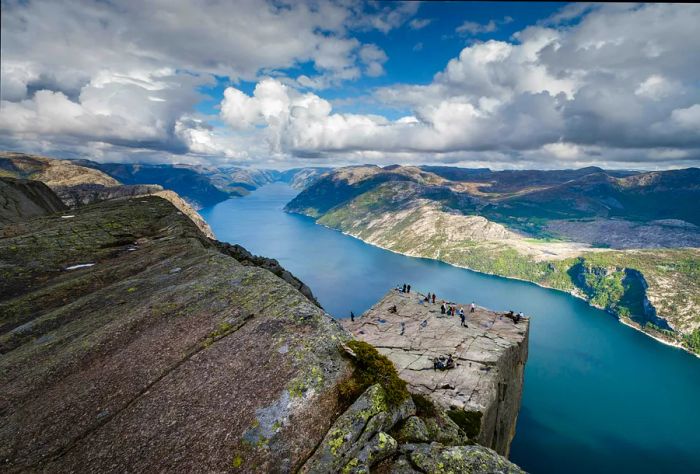 A stunning view of a rocky promontory set against Norway's fjords.