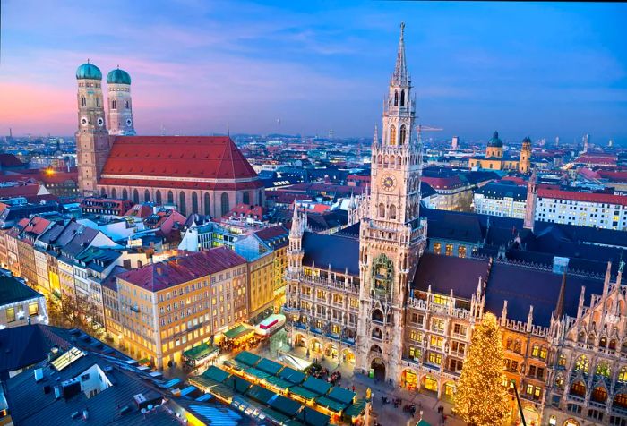 Christmas trees and stalls fill the square in front of the Gothic Revival-style New Town Hall, with stunning views of the red-tiled Frauenkirche, topped with its iconic domed spires.