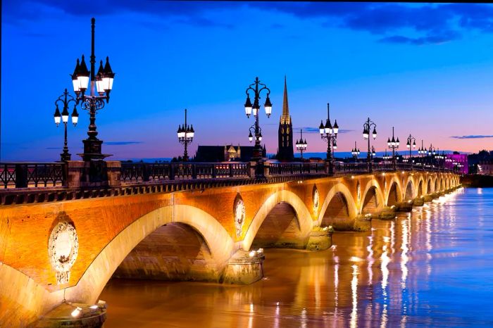 Cross the Pont de Pierre to discover one of the finest neighborhoods in the city