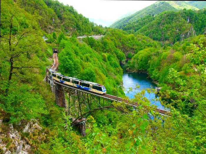 The panorama from Intragna overlooking the River Melezza as the Centovalli Express journeys through Switzerland's Hundred Valleys.