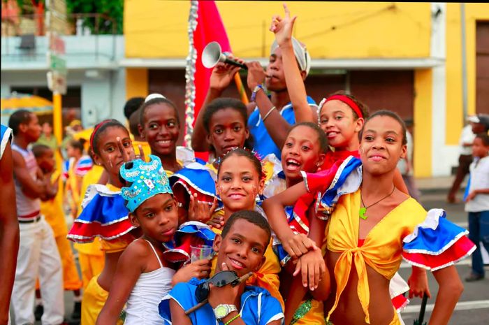 Children dressed in vibrant costumes at the Carnival in Santiago de Cuba