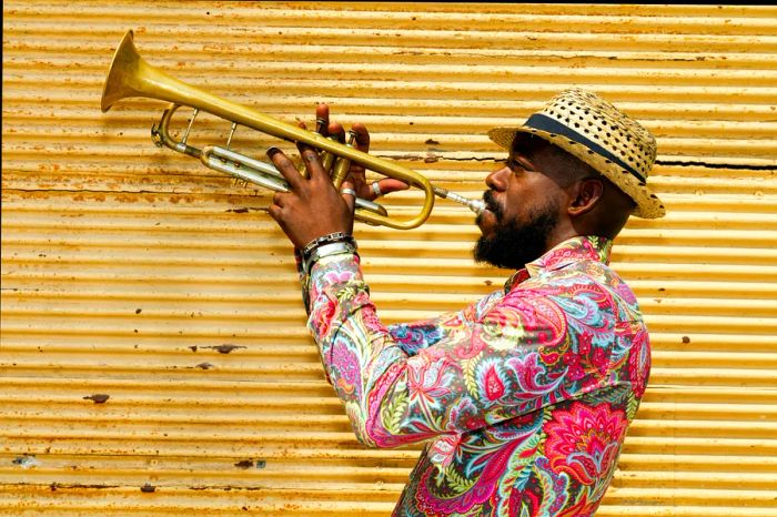 Cuban musician performing on the trumpet in Havana, Cuba