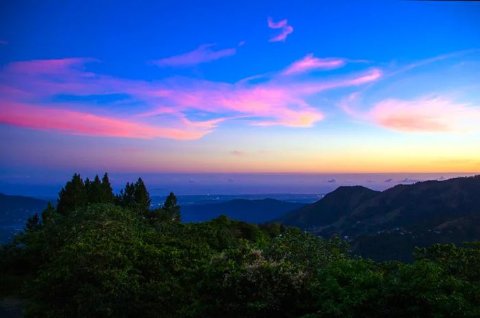 A stunning violet-and-pink sunset from the Cordillera Central mountain range in Puerto Rico.