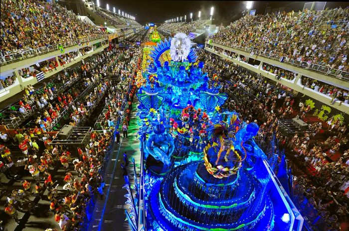 A samba school showcasing its talents in the Sambódromo carnival stadium, with 90,000 spectators at the renowned carnival in Rio de Janeiro, Brazil.