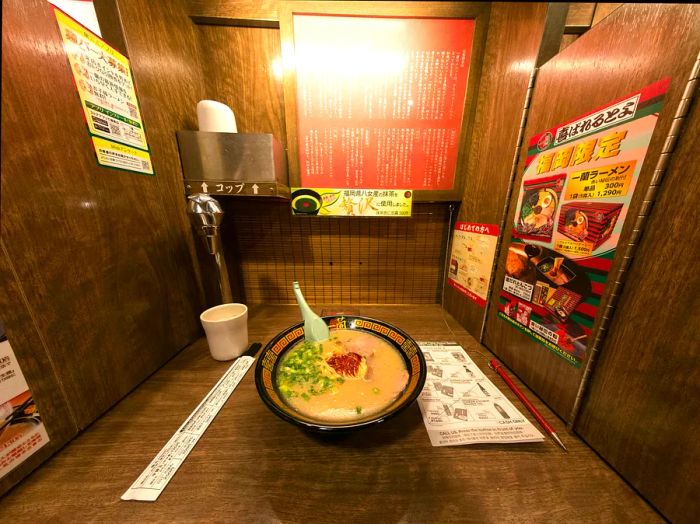 A bowl of ramen served in a private booth at Ichiran, Hakata railway station, Fukuoka, Japan