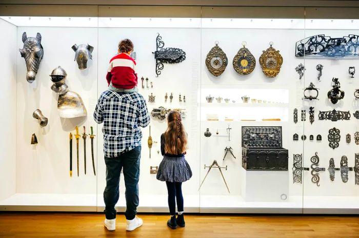 A family enjoys a museum visit together.