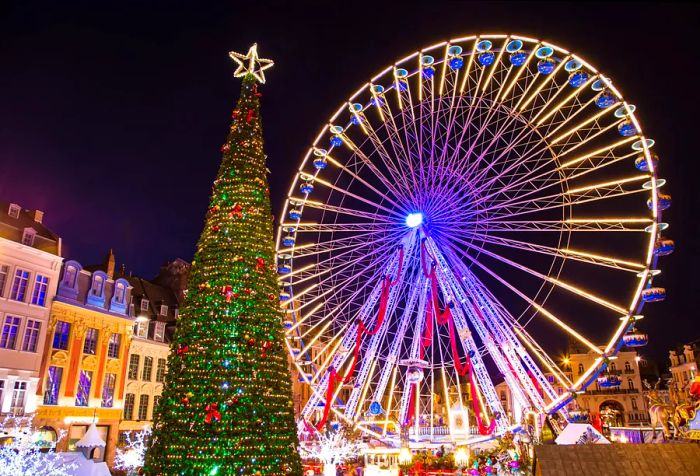 A vibrant nighttime atmosphere with a dazzling Ferris wheel and a beautifully adorned Christmas tree topped with a star, all set in a charming European-style square during the holiday festivities.