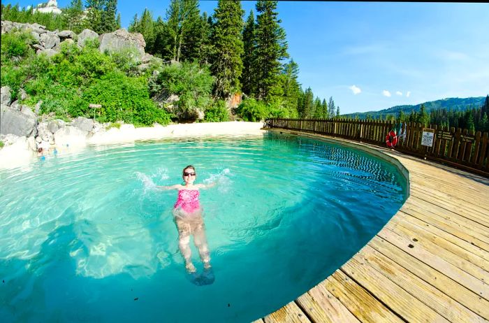 Visit a natural hot spring in Jackson Hole, Wyoming, for a soothing soak. melissamn/Shutterstock