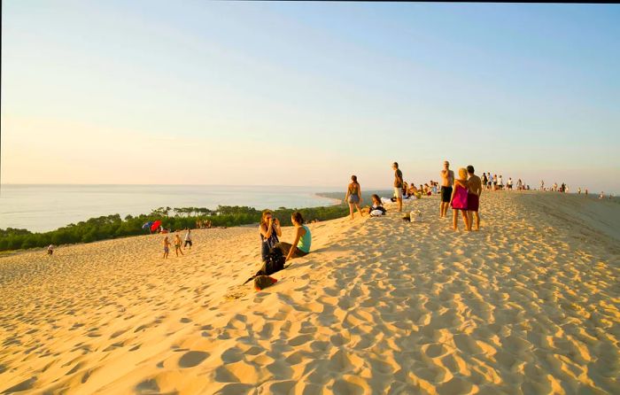 Visitors on Dune du Pilat at Bassin d’Arcachon, Gironde, France