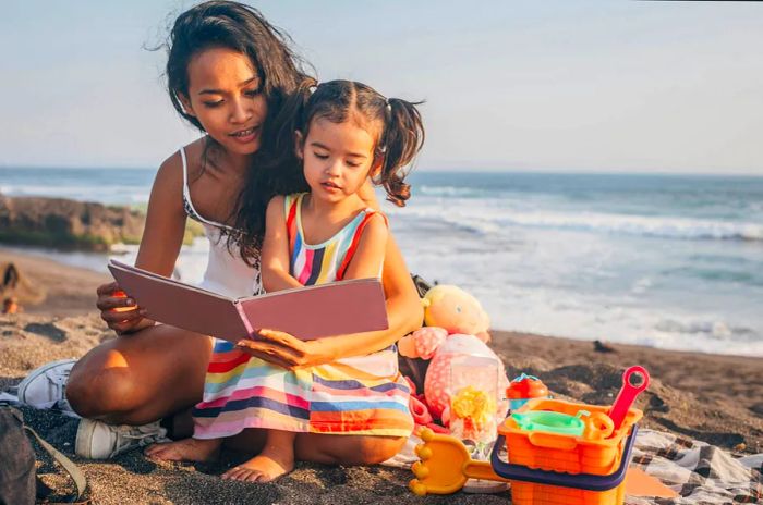 A mother and daughter enjoy a day at the beach in Indonesia