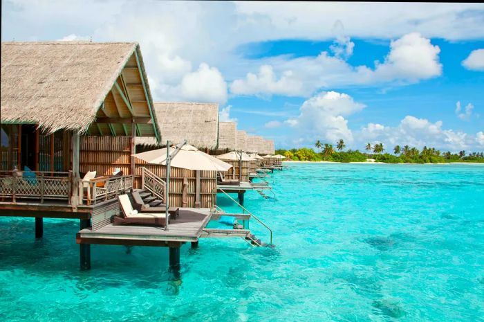 Over-water villas perched above the ocean in the Maldives