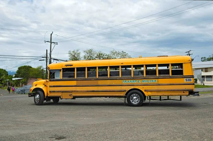 Yellow city bus in Guabito (Panama), near the Costa Rica border