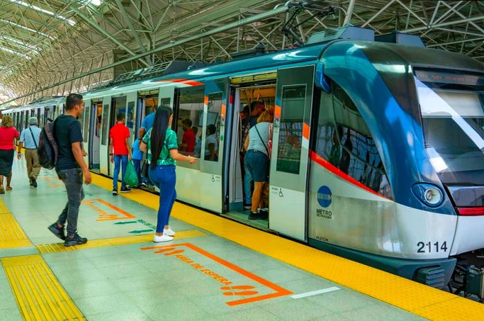 Passengers aboard a subway train in Panama City