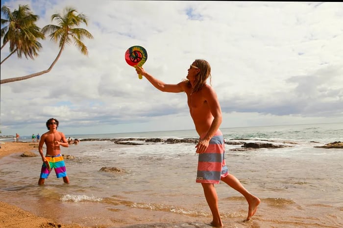 Young men enjoying beach sports in Puerto Rico