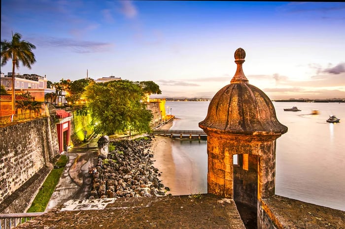 The picturesque waterfront in San Juan, Puerto Rico, featuring impressive fortifications