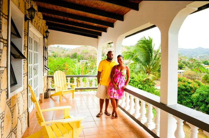 Couple enjoying a homestay on the verandah in the Caribbean