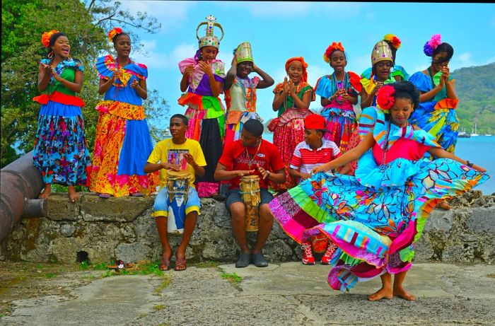 Traditional congo dancers adorned in vibrant costumes in Portobello, Panama