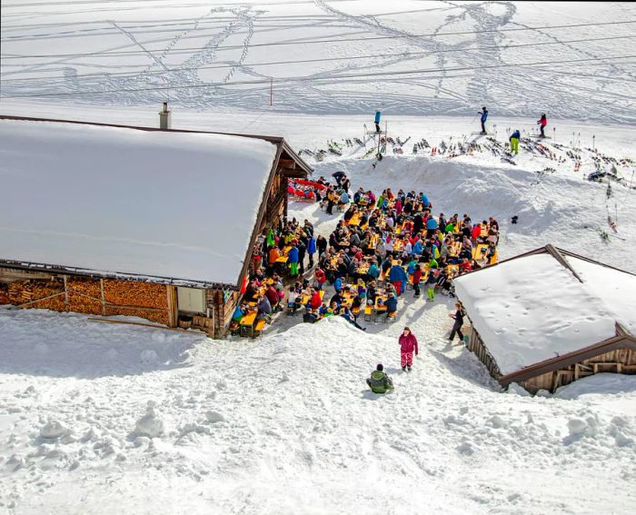 People unwinding in an après-ski bar in Tirol, Austria