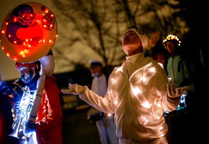 People participate in a lantern festival to honor the winter solstice in Vancouver, Canada.