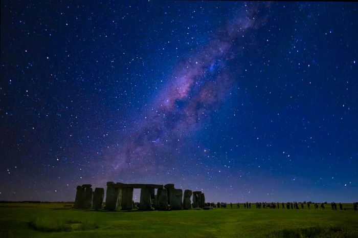 Stonehenge under the starry sky during the winter solstice