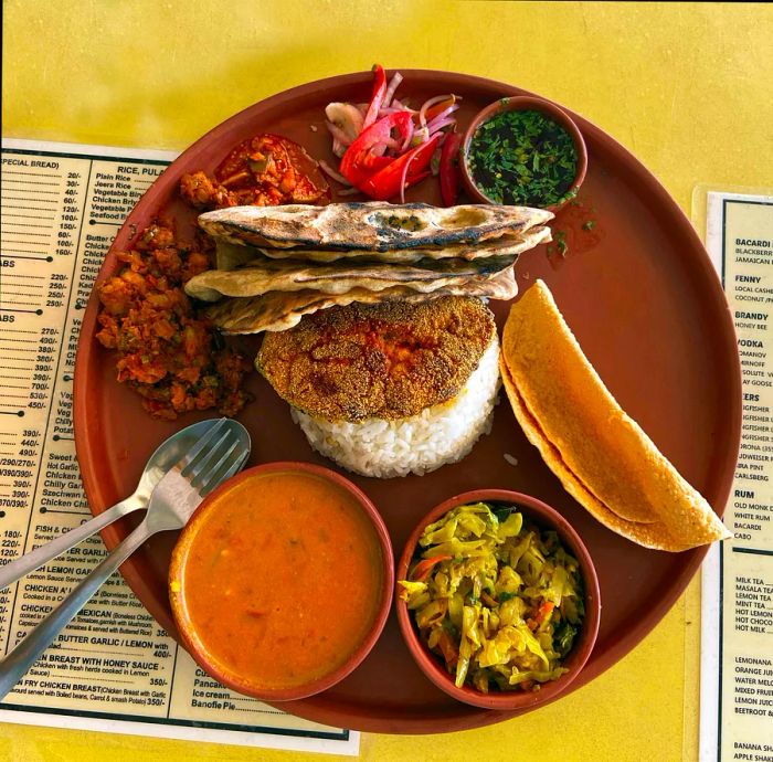 A Goan fish thali served at a beachside restaurant on Palolem Beach, Goa, India.