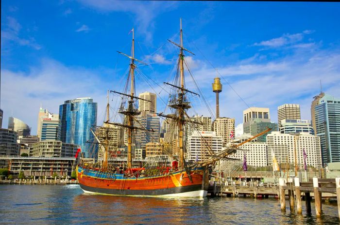 The replica of HMS Endeavour docked next to the Australian National Maritime Museum in Darling Harbour