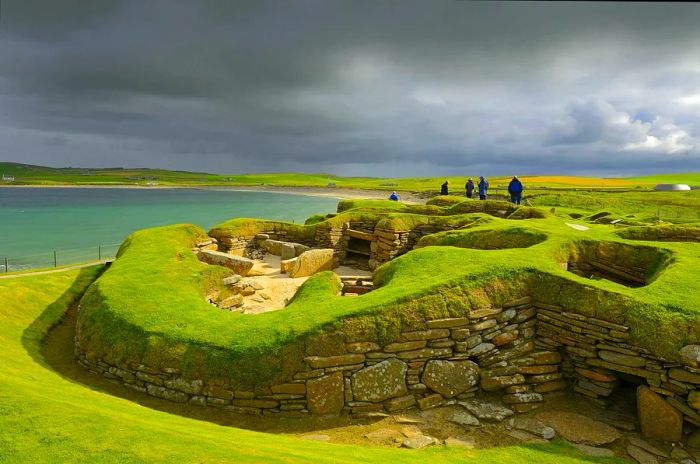 The ancient stone remains of Skara Brae located on the shores of Mainland Orkney