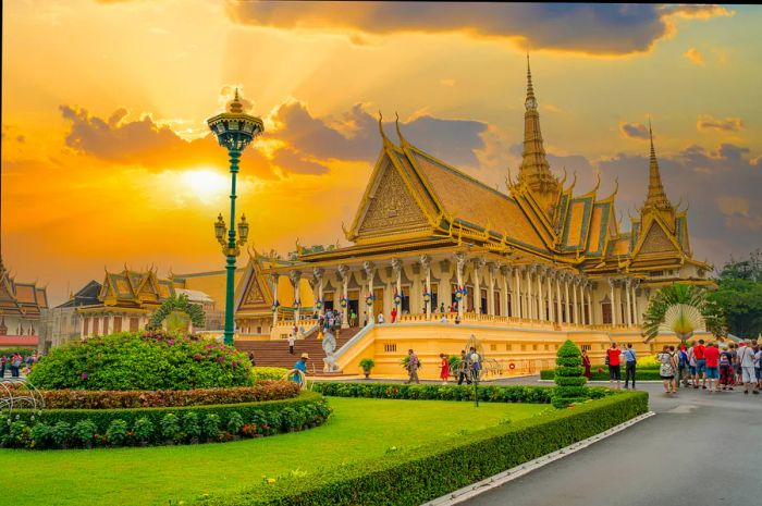 The Royal Palace in Phnom Penh glows in the surreal light of the afternoon