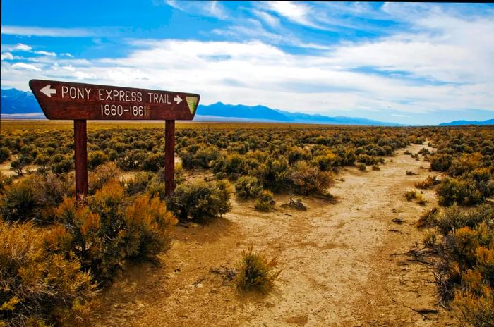 A marker indicates the historic Pony Express Route along Highway 50 in Nevada.