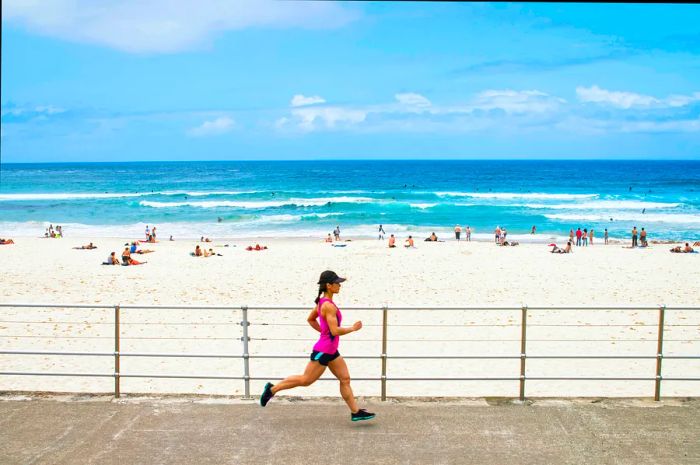 Running along Bondi Beach.