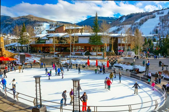 The Solaris Plaza Ice Rink in Vail village provides engaging activities for the entire family. Margaret Wiktor/Shutterstock