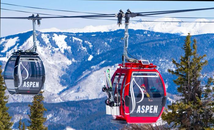 Gondolas transporting skiers in Aspen, Colorado, USA