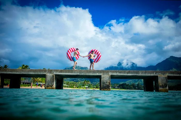 A couple of men celebrating their marriage in Hawaii in June 2019, enjoying an adventurous day together.