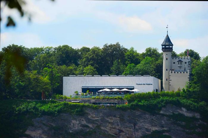 On July 29, 2011, the Salzburg Museum of Modern Art (L) and the historic water tower are captured in Salzburg, Austria.